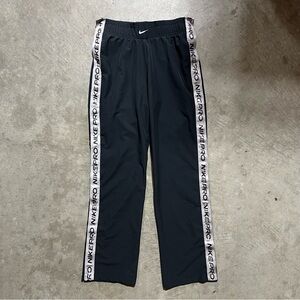 Nike Pro Basketball Swoosh Spell-Out Break-Away Snap Pants - Women's Small